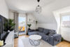 Blömker! Wohlfühlen in moderner 3,5 Zimmer DG-Wohnung mit Balkon und Garage! - Wohnzimmer