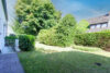Blömker! Freistehendes Einfamilienhaus mit traumhaften Garten und zwei Garagen am Wittringer Wald! - Rückansicht Garten