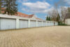 Blömker! En-Bloc Verkauf von 11 ETW´s und 11 Garagen in GLA-Rosenhügel! Alle Einheiten vermietet! - Garagenhof